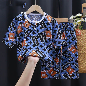Baby Summer Cotton Silk Clothes featuring a dinosaur print outfit in yellow for toddlers.