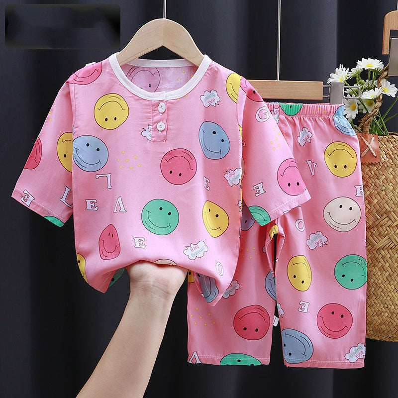 Baby Summer Cotton Silk Clothes featuring colorful smiley face patterns in pink fabric